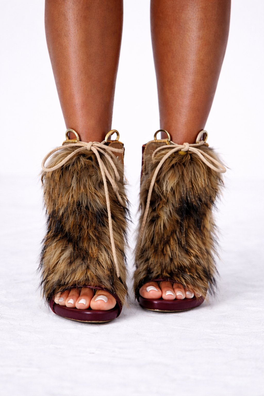 “Out Your League Fur Heels”